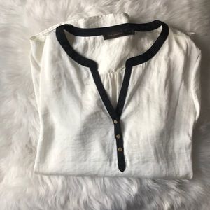 The limited cream flowing top